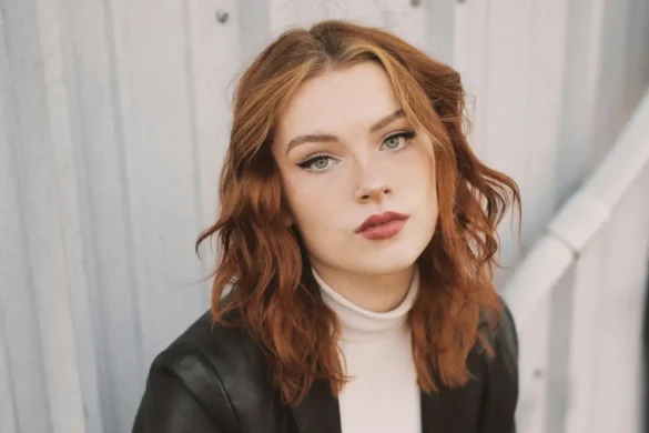 Young red head with upset expression.