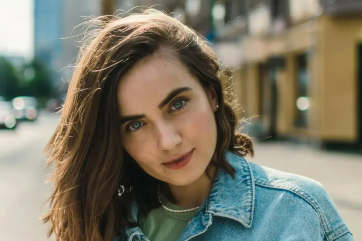 Woman staring into the camera with a sinister face expression.