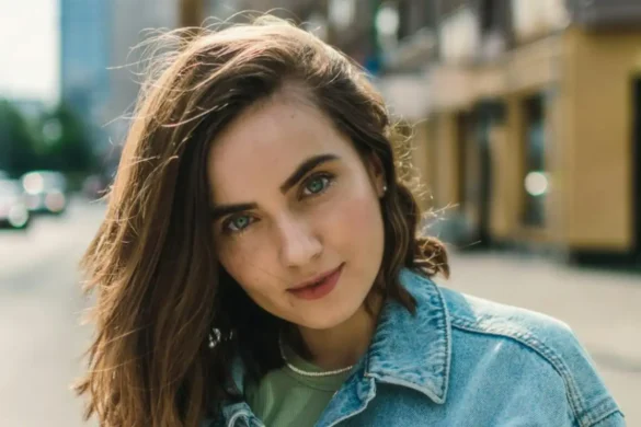 Woman staring into the camera with a sinister face expression.
