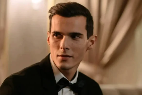 A young gentleman from the 30s dressed a tuxedo.